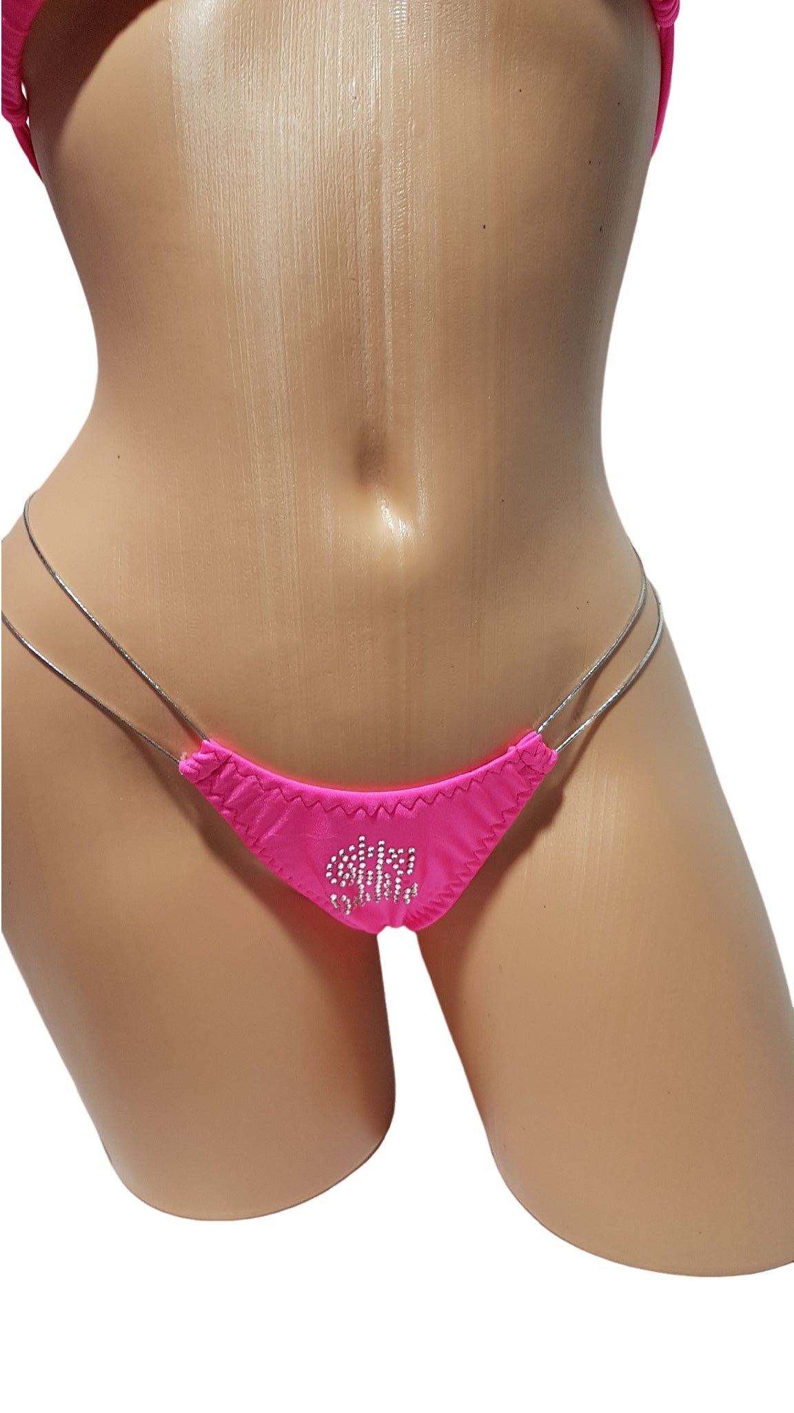 Hot pink exotic dancer bikini set featuring a triangle top, rhinestone dollar sign G-string, and silver cord side detailing.